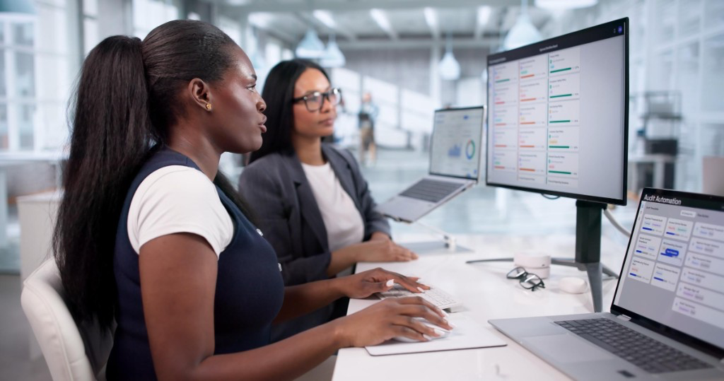 Procurement team collaborating with audit automation and compliance dashboards